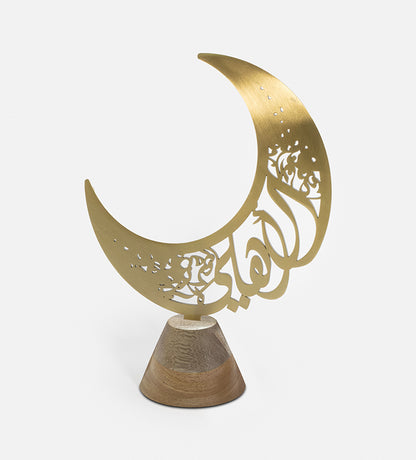 Custom-made home décor for Ramadan by Kashida design, in the shape of a Ramadan Hilal with Arabic calligraphy names