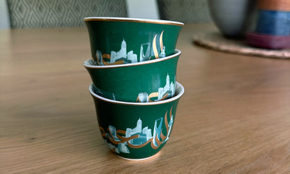 Beautiful emerald green Saudi arabia themed corporate gifts designed by Kashida featuring KSA's famous landmarks