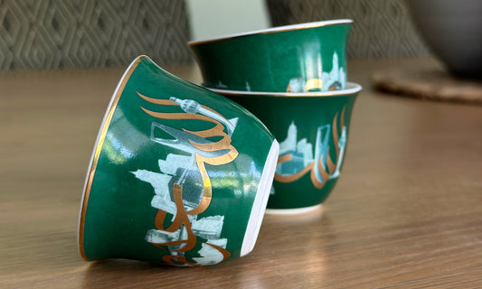 Beautiful emerald green Saudi arabia themed corporate gifts designed by Kashida featuring KSA's famous landmarks