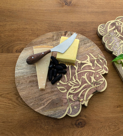 Contemporary cheese board in mango wood with Arabic calligraphy inlay