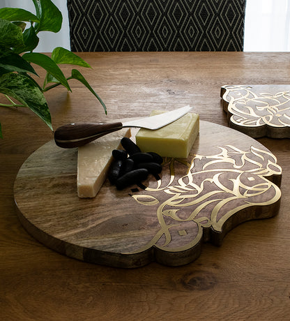 Contemporary cheese board in mango wood with Arabic calligraphy inlay