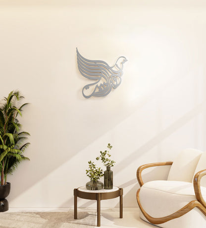 Arabic calligraphy in bird shape that reads God Bless Our Home