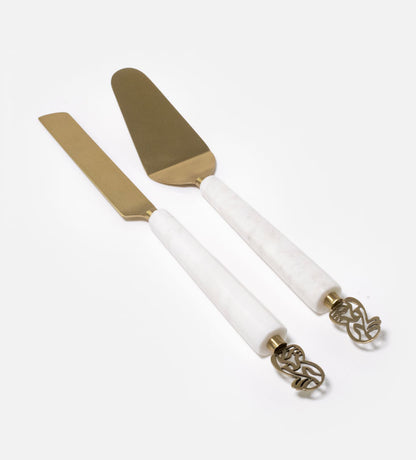 Elegant cake knife and servers made with marble and brass featuring Arabic calligraphy designs.