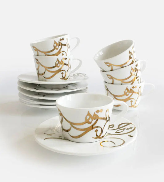 Contemporary gold and silver porcelain espresso cups with Arabic graffiti print