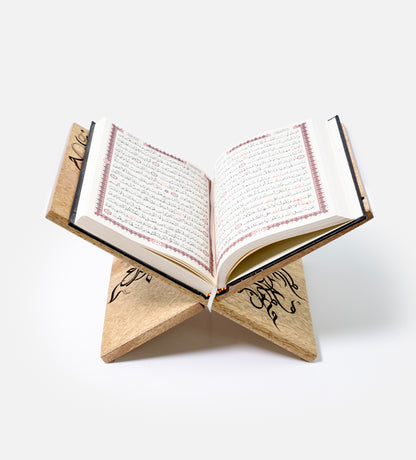 Handmade wooden quran holder featuring artwork of birds merged with Arabic calligraphy made with brass inlay