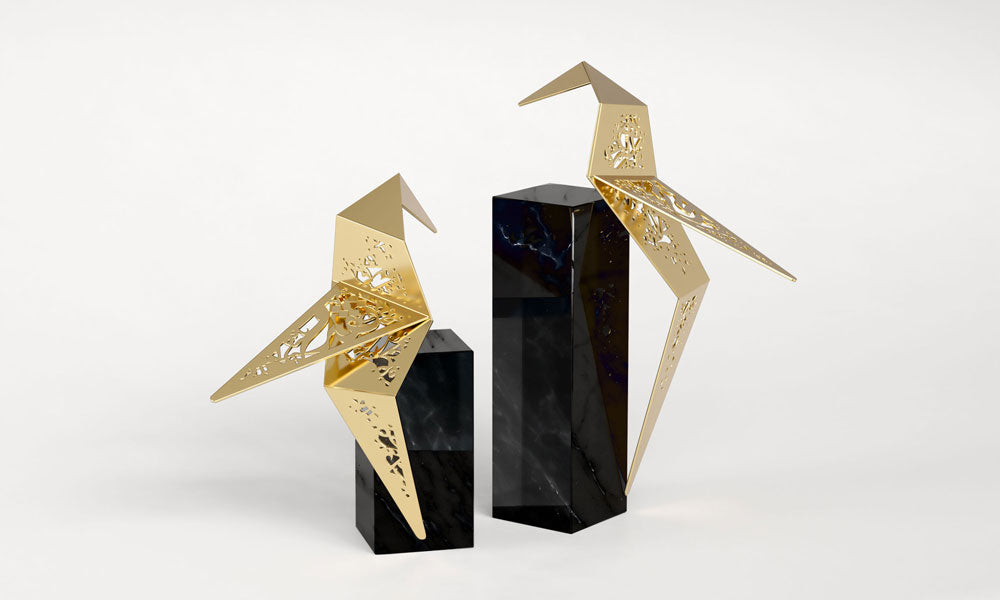 Set of two luxury falcon bird sculptures featuring Arabic calligraphy designed by Kashida