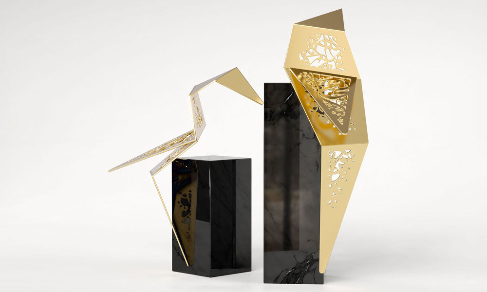 Set of two luxury falcon bird sculptures featuring Arabic calligraphy designed by Kashida