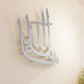Islamic word in Arabic calligraphy suitable for gifting a traditional Muslim household