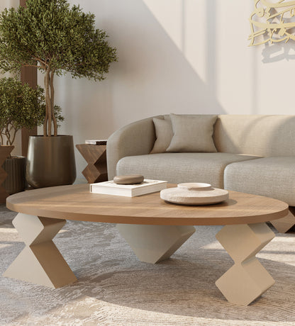 Modern and minimalist pebble-shaped wooden coffee table from Kashida design's latest collection, Nuqat.