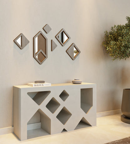 Minimalistic modern beige console table by Kashida with diamonds and triangles cut through the wood