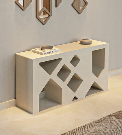 Minimalistic modern beige console table by Kashida with diamonds and triangles cut through the wood