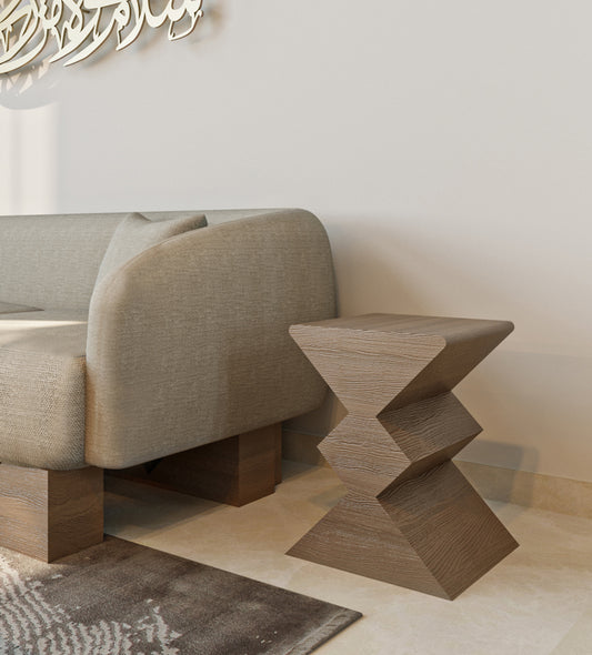 Modern wooden side table from Kashida's nuqat collection with irregular diamond-shaped structure