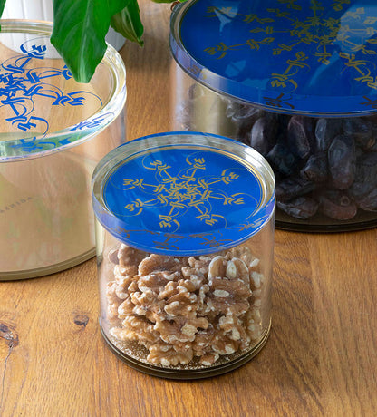 Small Acrylic cylinder container in royal blue and gold with Arabic calligraphy pattern for storing sweets