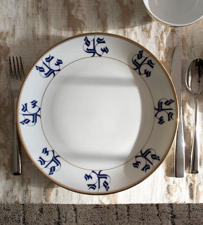 Elegant porcelain dinner plate with Arabic calligraphy pattern in royal blue and gold