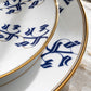 Elegant porcelain dinner plate with Arabic calligraphy pattern in royal blue and gold