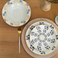 Elegant porcelain dinner plate with Arabic calligraphy pattern in royal blue and gold
