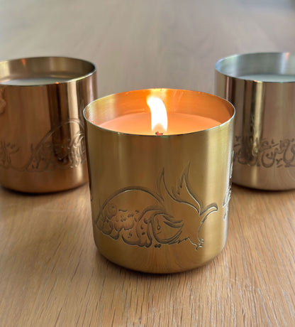 Hand-poured scented candles with fragrances that relate to the UAE in three beautiful metal canisters with Arabic calligraphy etchings featuring a poem by Sheikh Mohamad Bin Rashed Al Maktoum.