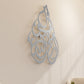 Tear-drop shaped Islamic wall art featuring a quranic verse called surah al ikhlas