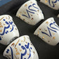 Custom made Arabic coffee cups in Arabic calligraphy designed as a corporate gift for Bovet timepieces