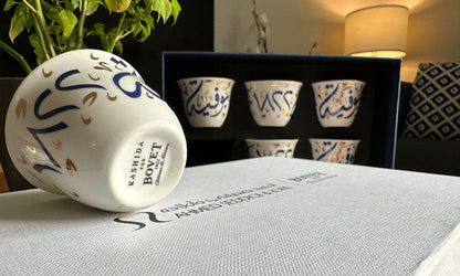 Custom made Arabic coffee cups in Arabic calligraphy designed as a corporate gift for Bovet timepieces