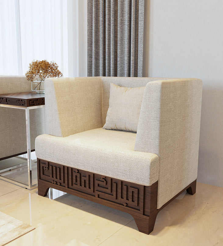 Wide upholstered armchair featuring Arabic calligraphy carved woodwork from Kashida design