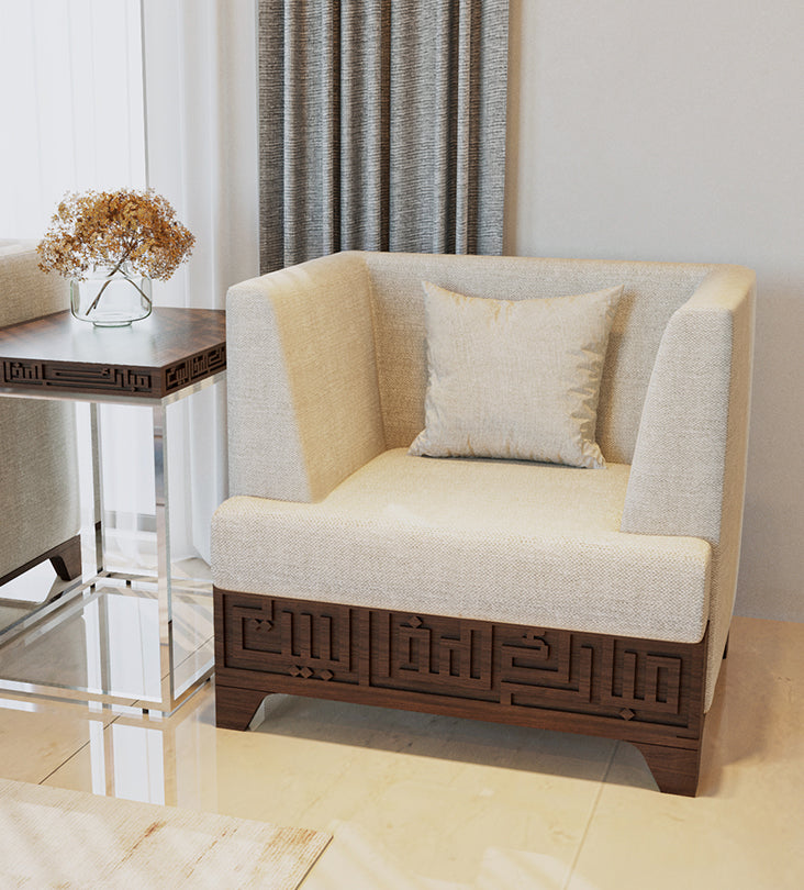 Wide upholstered armchair featuring Arabic calligraphy carved woodwork from Kashida design