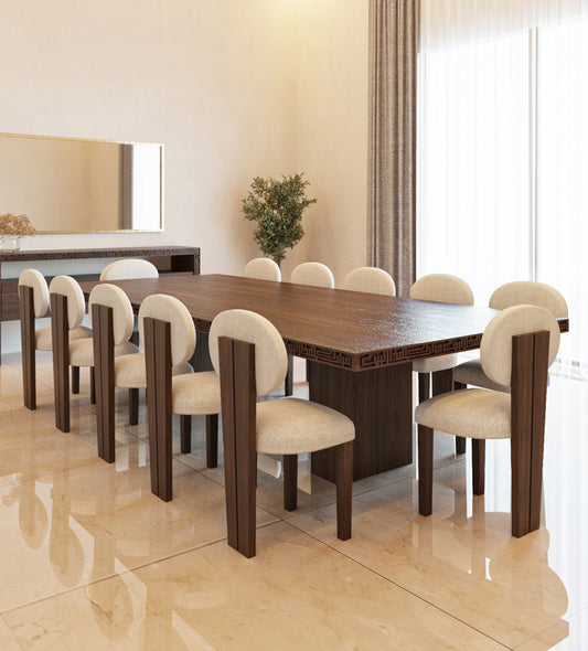 Luxurious wide wooden dining table with arabic calligraphy carvings that fits up to 12 people.