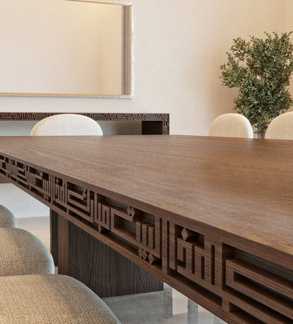 Luxurious wide wooden dining table with arabic calligraphy carvings that fits up to 12 people.