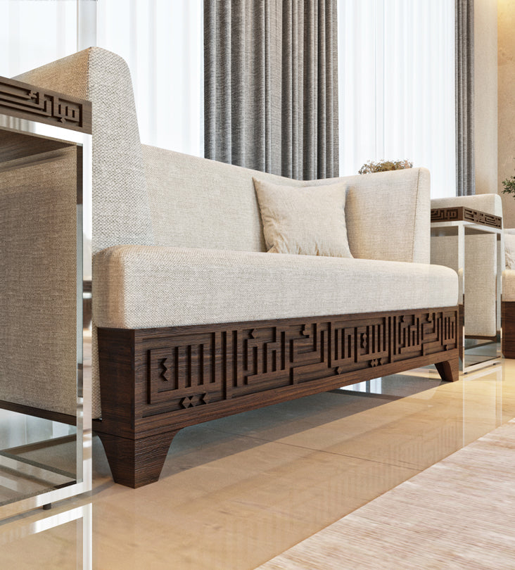 Beige upholstered 3 seater sofa featuring Arabic calligraphy carved woodwork from Kashida design