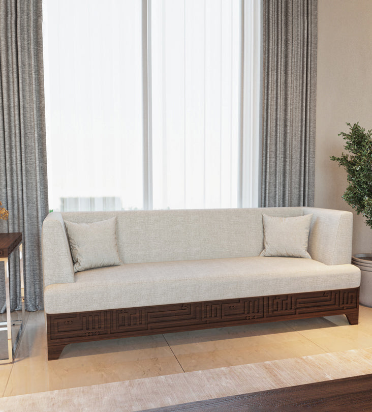 Beige upholstered 4-seater sofa featuring Arabic calligraphy carved woodwork from Kashida design