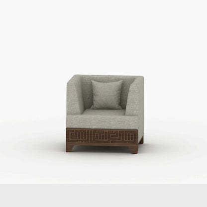 Wide upholstered armchair featuring Arabic calligraphy carved woodwork from Kashida design