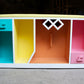 Mobile bookcase for children made from the word read iqra in Arabic calligraphy