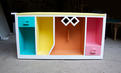 Mobile bookcase for children made from the word read iqra in Arabic calligraphy