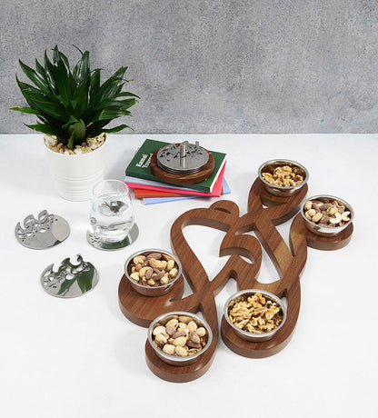 Set of six silver bowls with wooden base in Arabic calligraphy