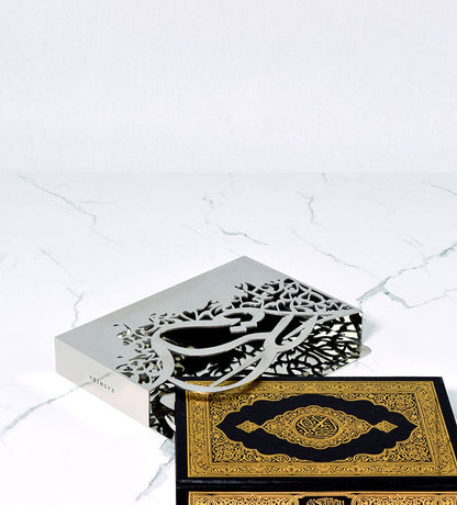 Silver sleeve for quran in Arabic calligraphy