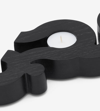 Flat wooden candleholder for tea light candles featuring the word love in Arabic calligraphy