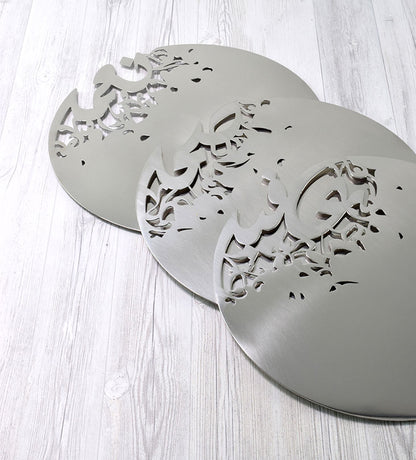 Silver stainless steel placemat in Arabic calligraphy