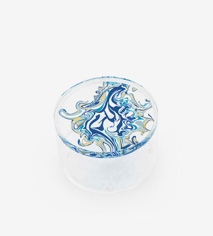 Contemporary transparent acrylic storage cylinders with Arabic calligraphy fluid art