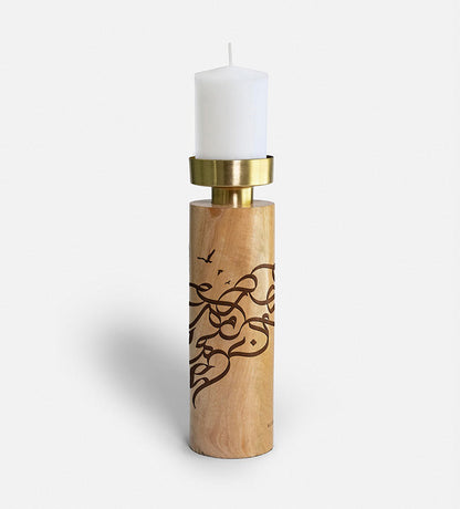 Wooden cylinder candle holders with brass top featuring Arabic graffiti etchings