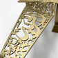 Beautiful brass plated decorative wall hangers shaped like origami birds with modern Arabic calligraphy designed by Kashida