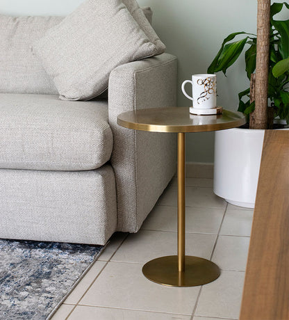 Brass round table with contemporary Arabic graffiti etchings