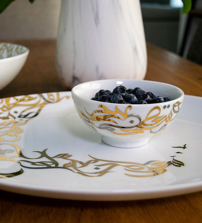 Small gold and silver contemporary serving bowls with Arabic graffiti letters