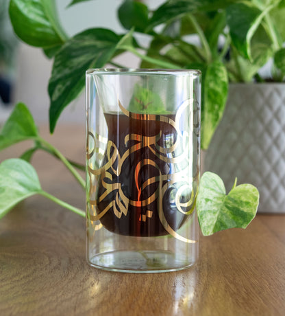 Contemporary glass tea cups with Arabic graffiti print