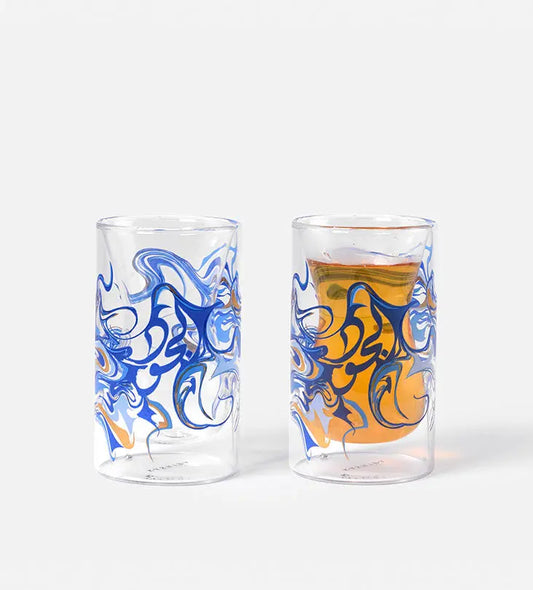 Contemporary glass tea cups with Arabic calligraphy fluid art