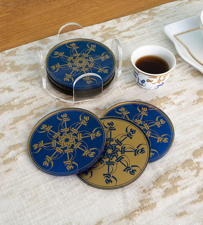 Set of six round acrylic coasters in royal blue and gold Arabic calligraphy pattern