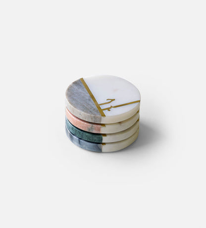 Beautiful pastel colored marble coasters with brass detail in Arabic calligraphy by Kashida